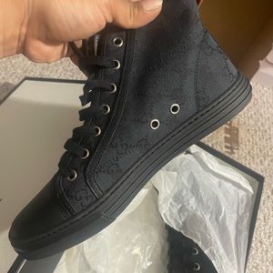 Black Gucci sneakers